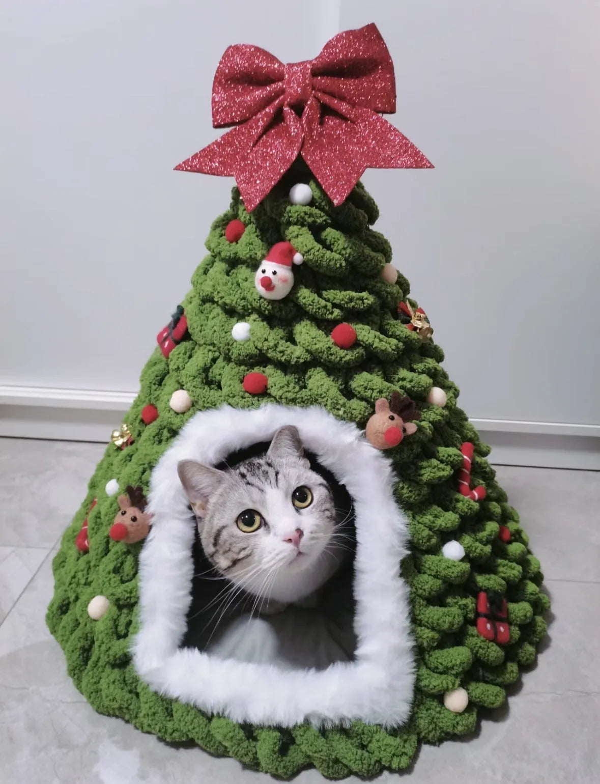 Grey cone-shaped felt cat house with tent-style enclosed design for indoor use