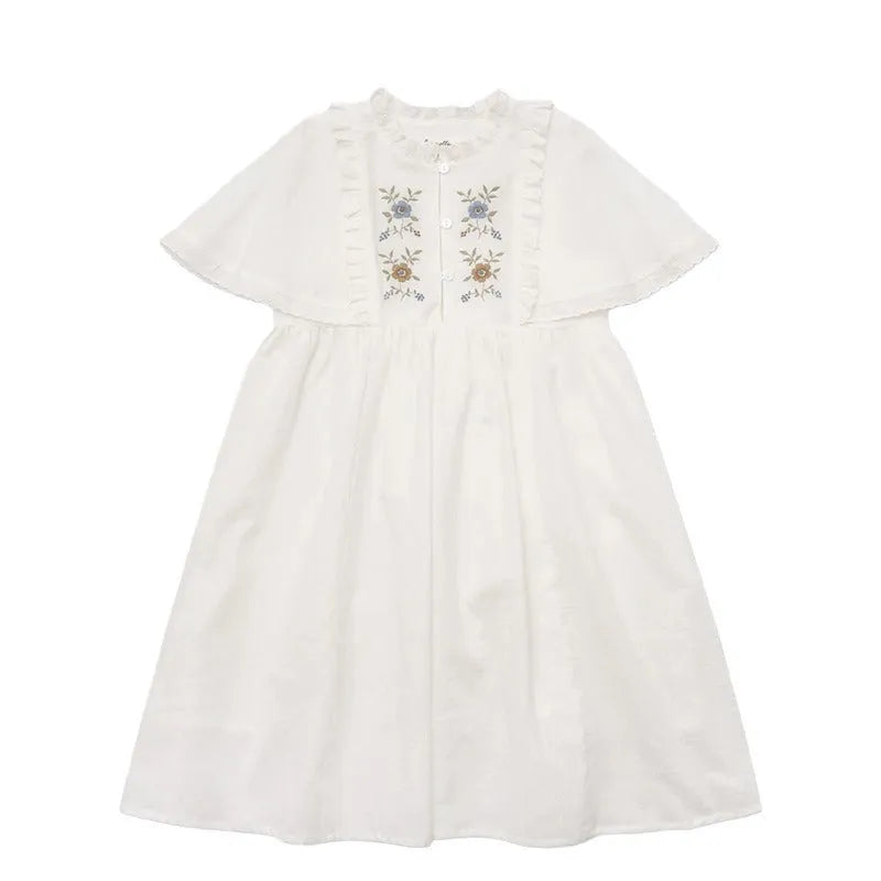 Girls white cotton summer dress with short ruffled sleeves and embroidered skirt detail