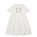 Girls white cotton summer dress with short ruffled sleeves and embroidered skirt detail
