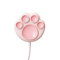 Pink cat claw sucker wireless charger on a desk with USB cable attached