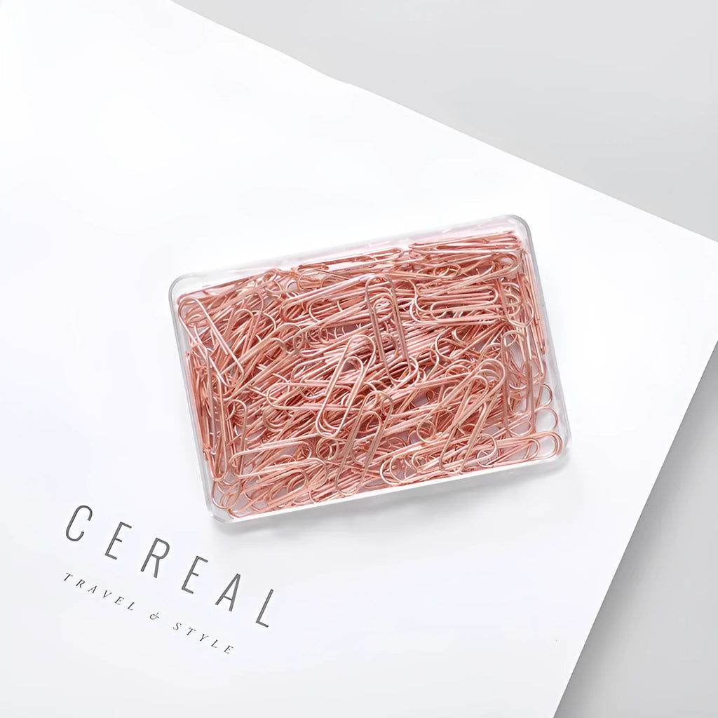 Rose gold heart-shaped metal paper clips in a box, size 28mm.