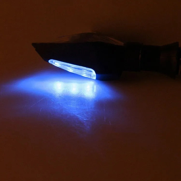 Motorcycle LED turn signal lights with double-sided luminous design showing yellow and blue lighting