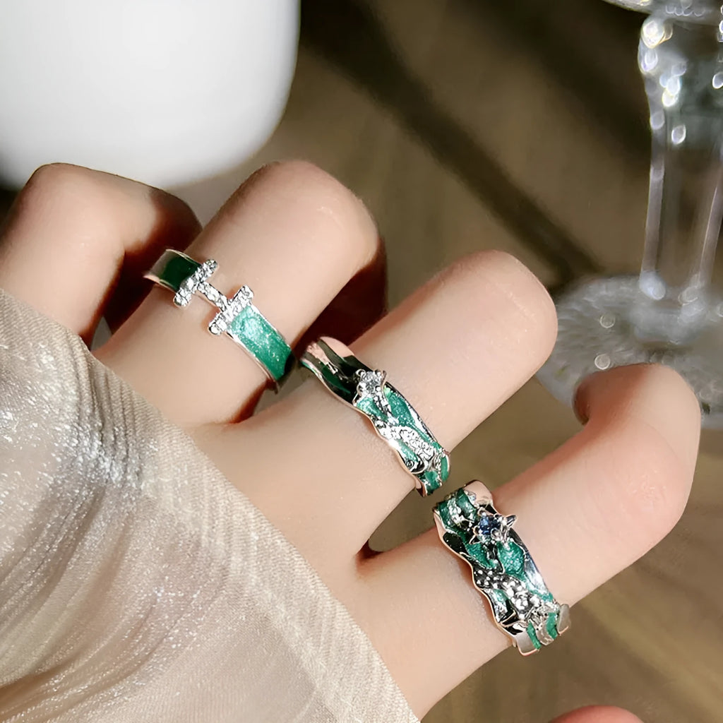 Mint green enamel astrology star ring with asymmetrical folded design on copper base