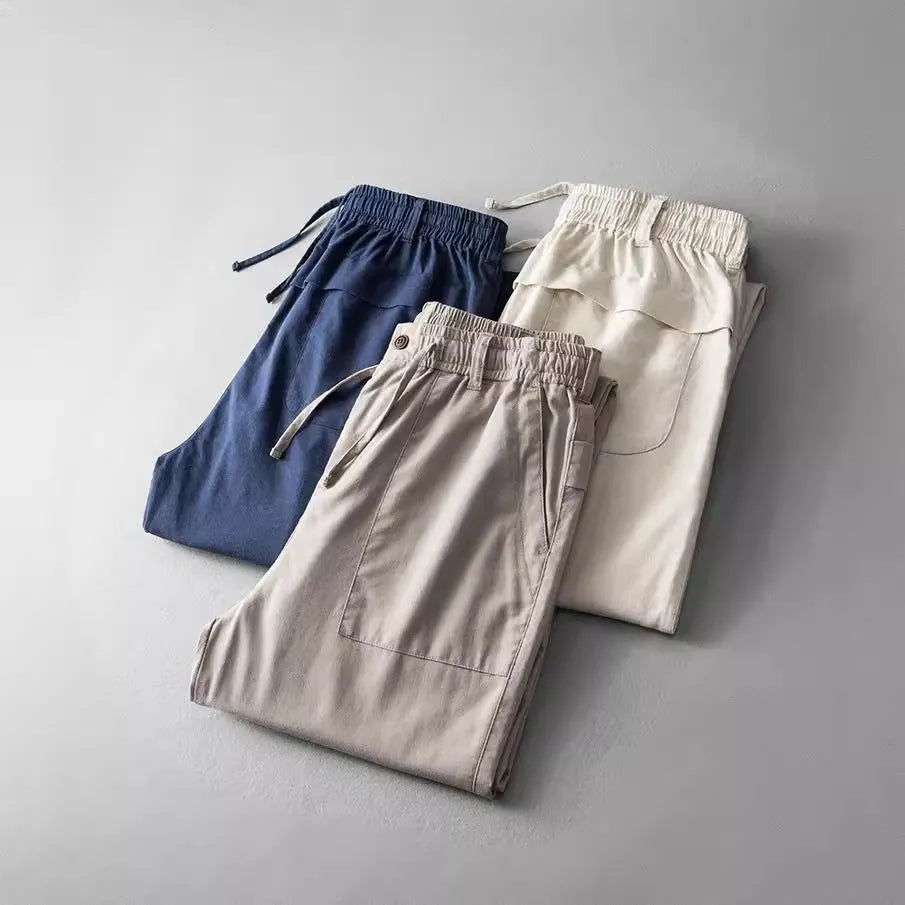 Men's linen casual trousers in solid colour with mid waist design available in three colour options