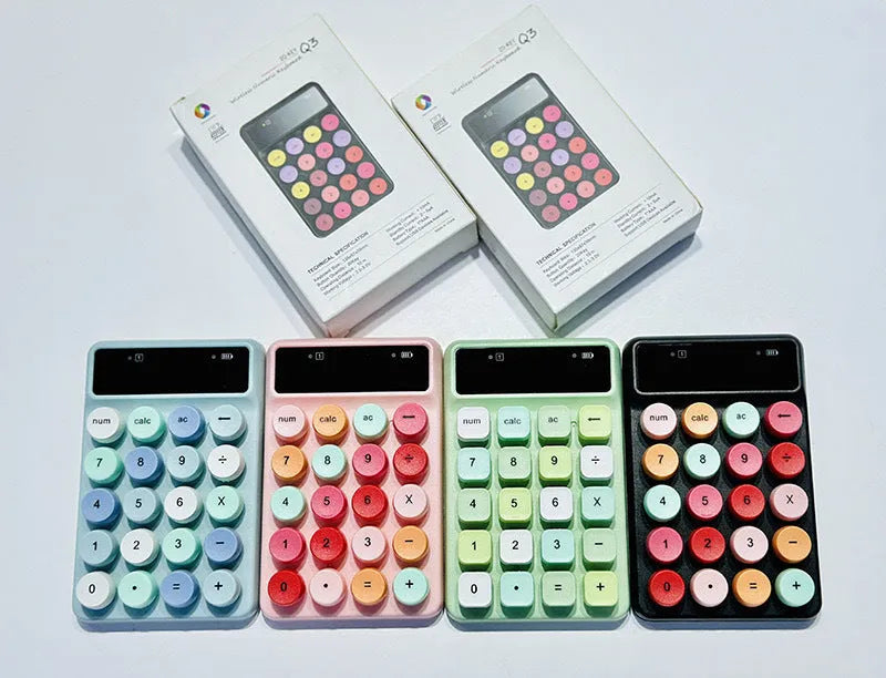 Mini portable wireless keyboard in a macaron colour option on a desk.