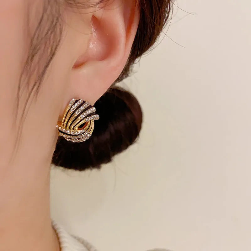 Super-flashing rhinestone ear studs with geometric ring shape and real gold plating on copper