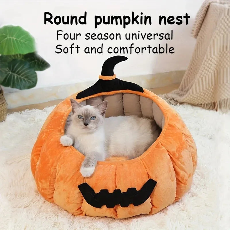 Orange Halloween pumpkin-shaped soft plush cat bed with a cartoon devil face design.
