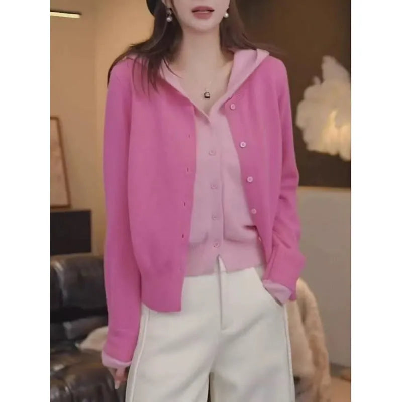 Women's long sleeve knit cardigan in pink with false two-piece design and colour contrast