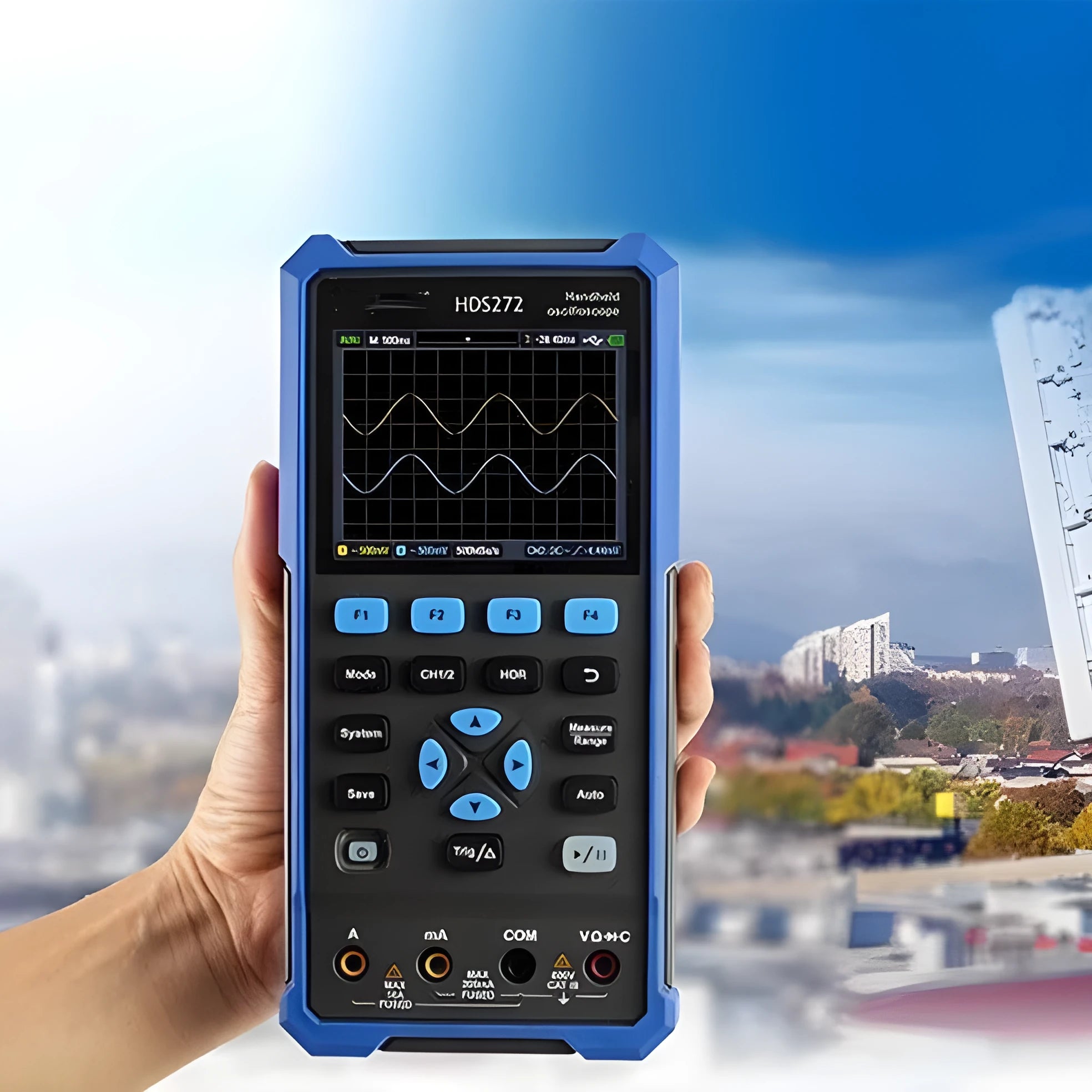 Owon HDS272 handheld digital oscilloscope with probe pen and accessories on workbench