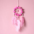 Pink dreamcatcher wind chime with ostrich feather ornaments, 10cm diameter wall decoration