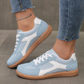 Women's retro casual training sneakers in a low-top style with a lace-up front and round toe.