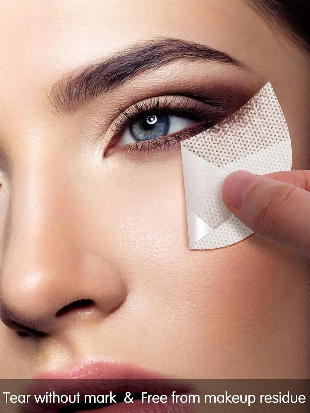 Pack of half-moon shaped disposable eyeshadow shields on a pink background