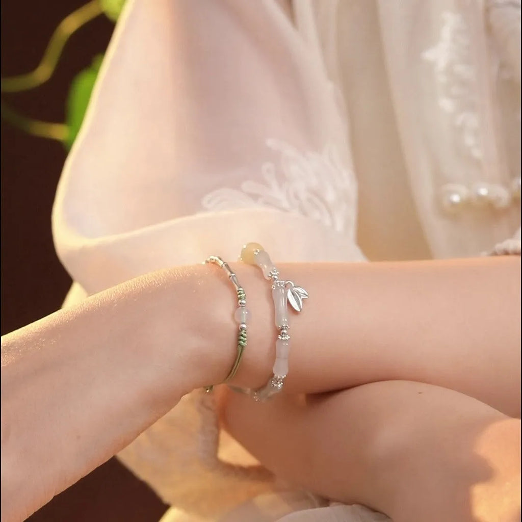 Silver-coloured antique-style bracelet made from natural Tianshan green bamboo with bamboo joint detailing.