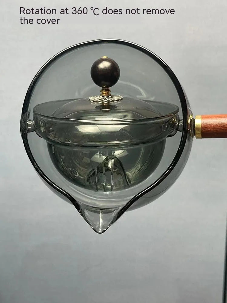 Semi-automatic rotary glass teapot with wooden handle and infuser, in grey and transparent colour options.