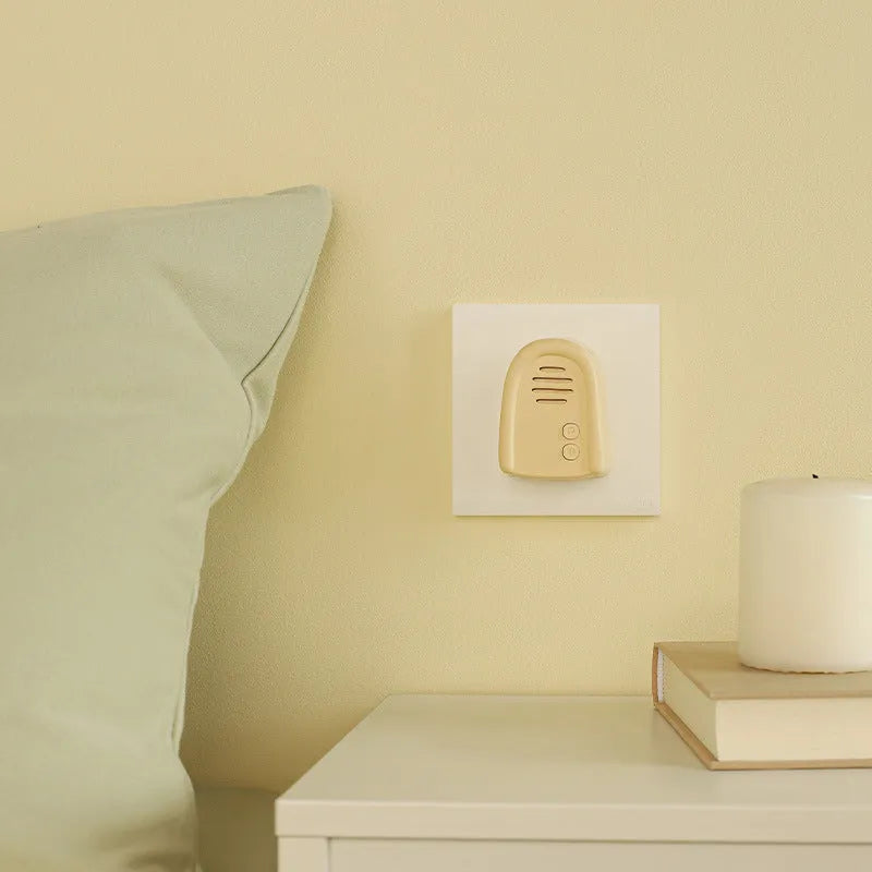 Wireless plug-in beeper doorbell system in milky yellow and white colour options with self-generating transmitter