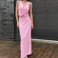 Pink polyester sleeveless vest and long split skirt suit for women