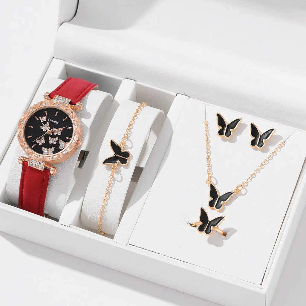 Women's butterfly quartz belt watch with imitation leather strap and pin buckle, available in black brown pink red beige