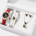 Women's butterfly quartz belt watch with imitation leather strap and pin buckle, available in black brown pink red beige