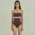 Brown women's one-piece triangle swimsuit showing front design on mannequin