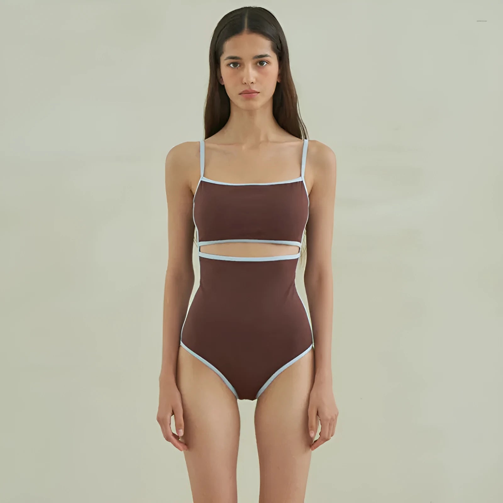 Brown women's one-piece triangle swimsuit showing front design on mannequin
