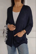Women's waffle-textured cardigan coat with nine-quarter length sleeves in Army Green.