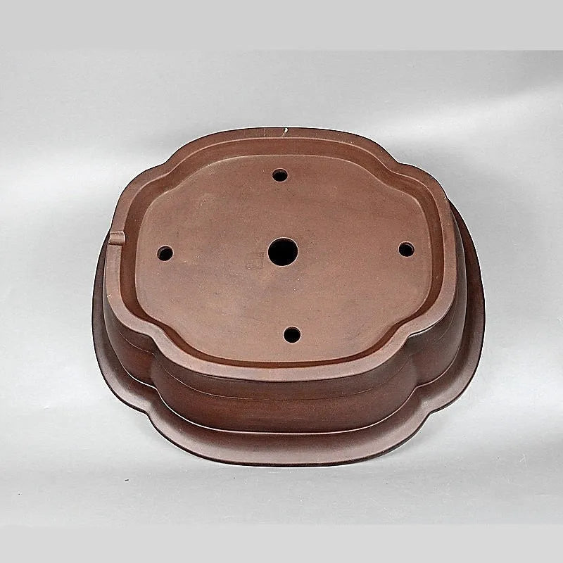 Handmade antique purple clay flowerpot in a crabapple shape, 74cm long.