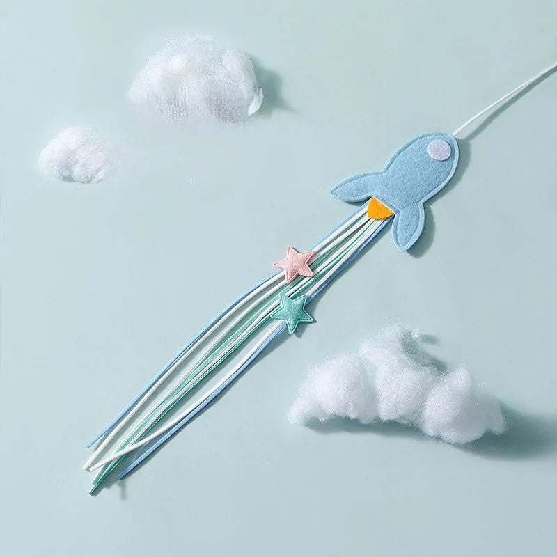 Blue cat toy wand with long pole and a bite-resistant rocket attachment decorated with feathers.