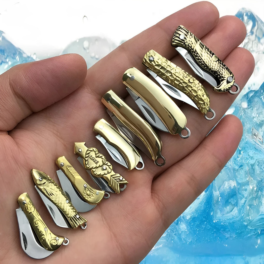 Brass mini folding knife keychain pendant with 3cm blade and 50mm or 60mm full length in five brass handle styles.