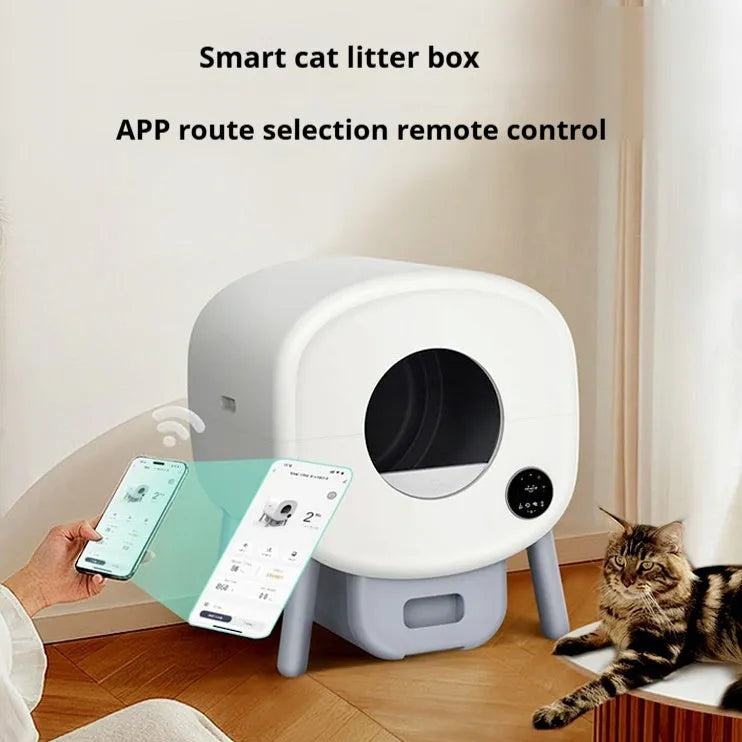 Automatic self-cleaning cat litter box made from white ABS plastic with a cleaning brush and tablets.