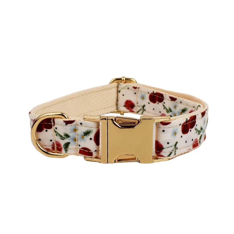 Red cherry printed dog collar set with leash, vest, poop bag, bow and light gold buckle