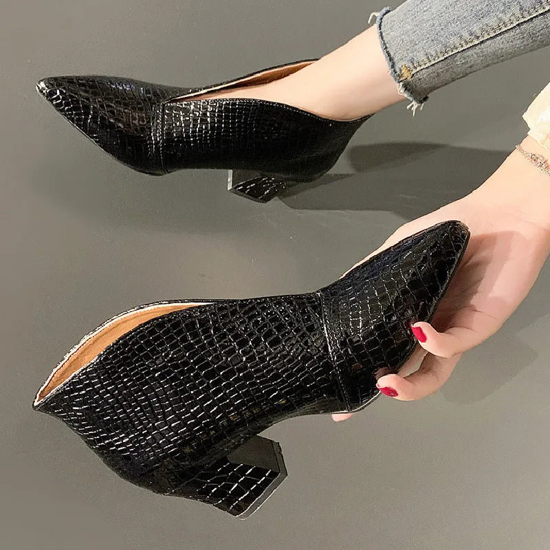 Women's black V-cut ankle boots with pointed toe and chunky 6-8 cm heels, embossed artificial PU upper