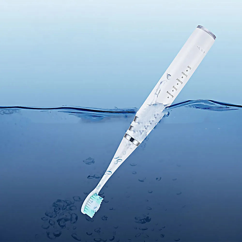 Electric toothbrush in white or black with 3 gears, USB charging, and optional 18mm or 20mm brush heads.