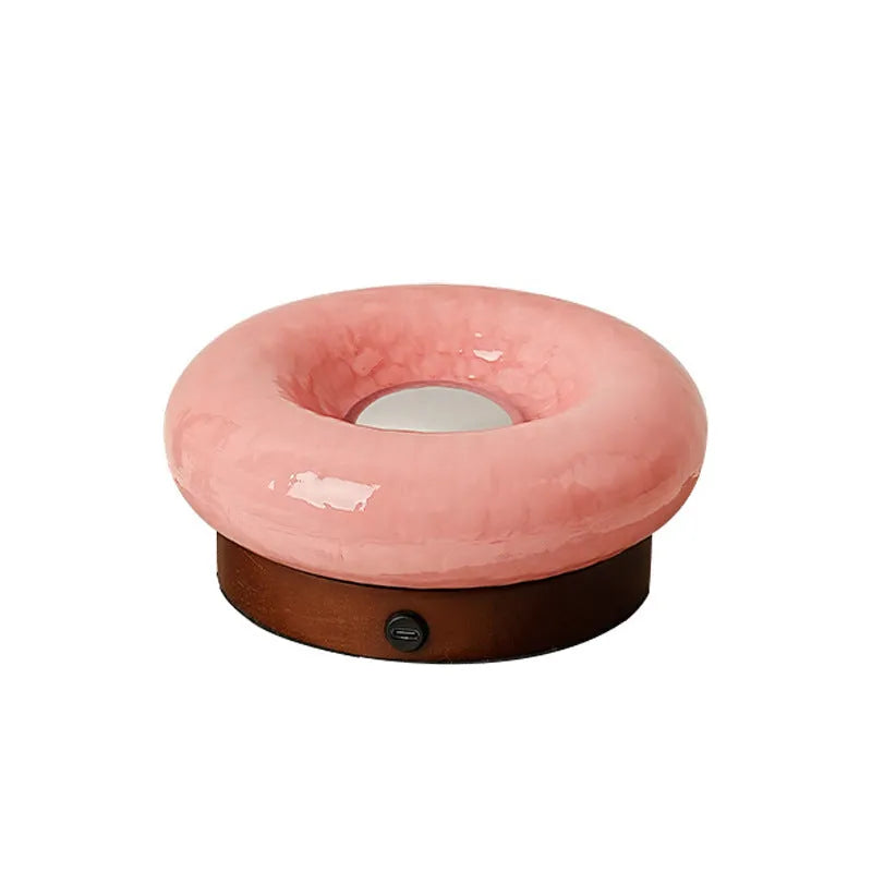 Rechargeable donut touch table lamp in custard, green, orange, or pink with three colour modes and charging cable