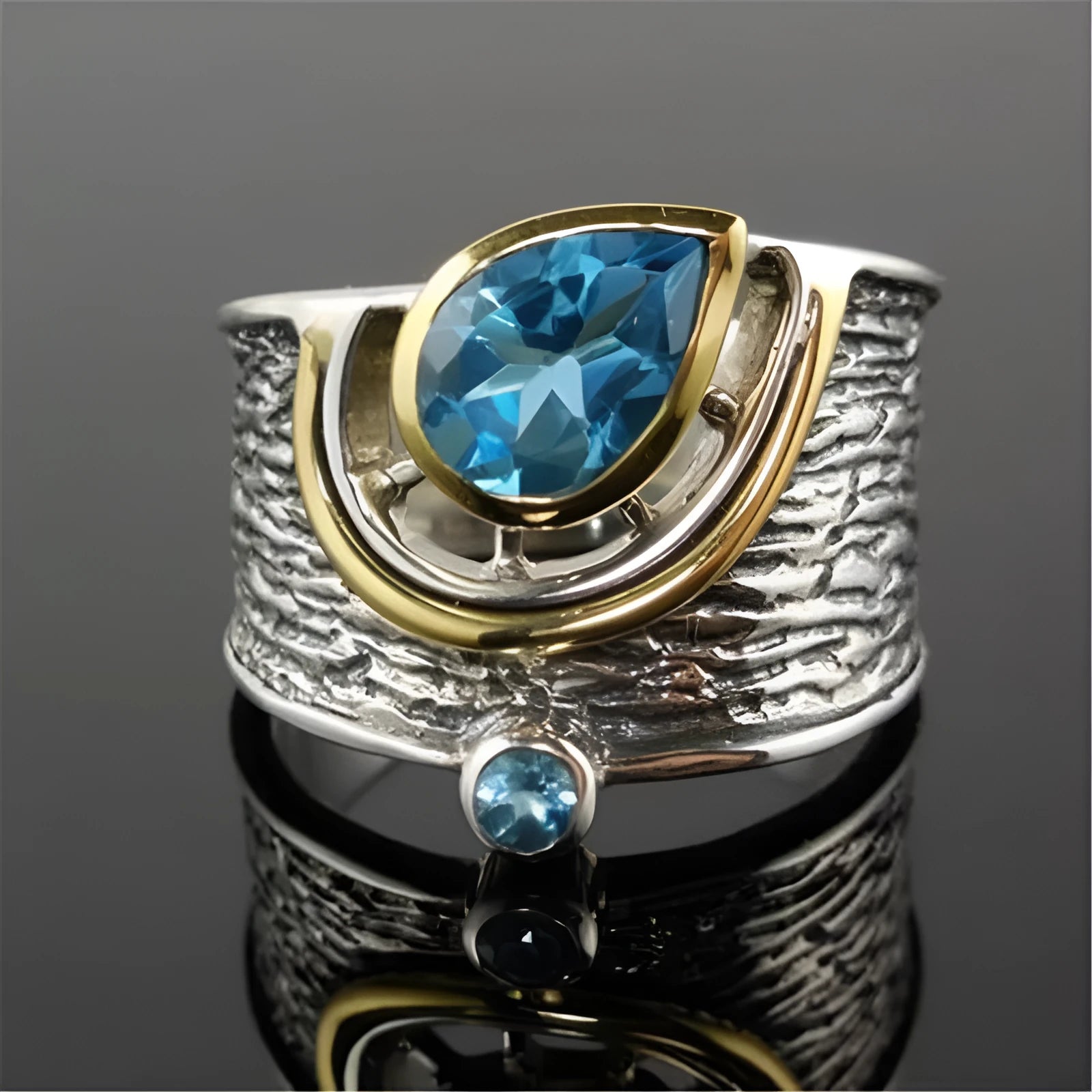 Women's blue zircon inlay ring in creative Chinese style drop shape design on alloy band