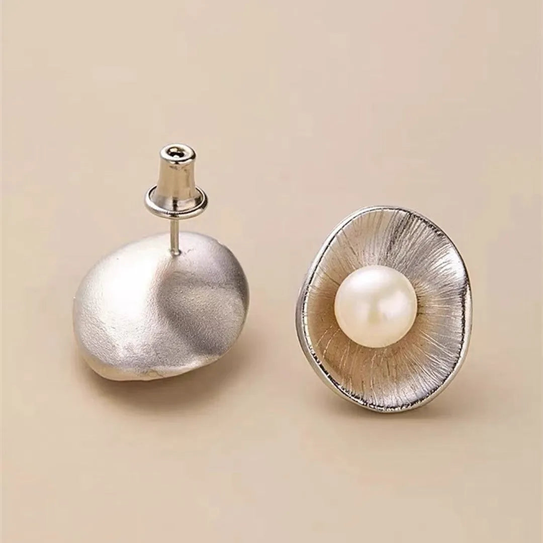 Pearl sterling silver geometric ear studs with gold electroplating and needle post fastenings