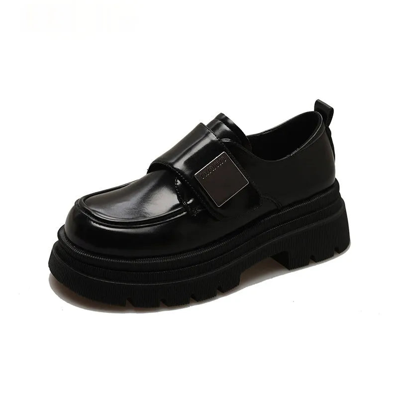 Women's chunky heel square toe shoes in black with cross strap and low top design