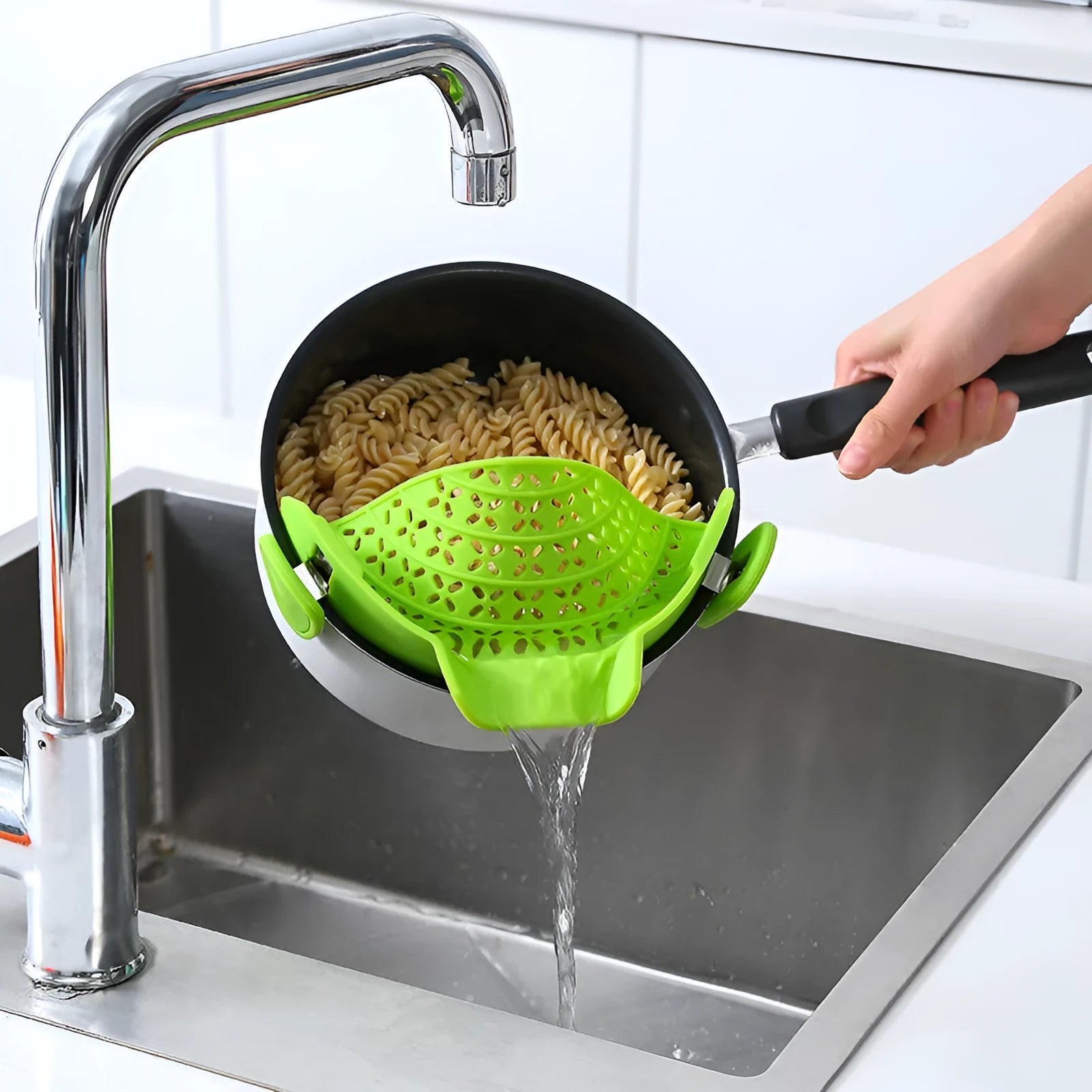 Silicone pot drain stopper kitchen gadget in five colour options on kitchen counter