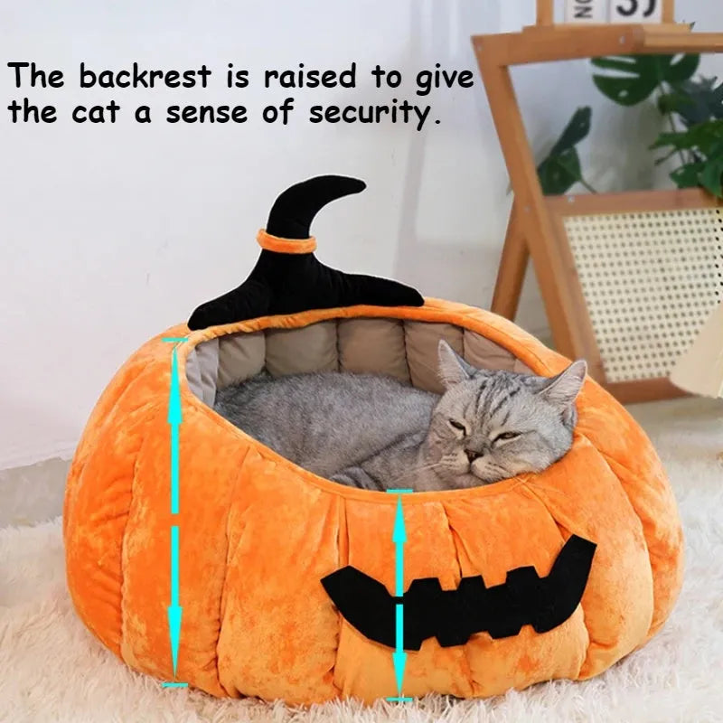 Orange Halloween pumpkin-shaped soft plush cat bed with a cartoon devil face design.