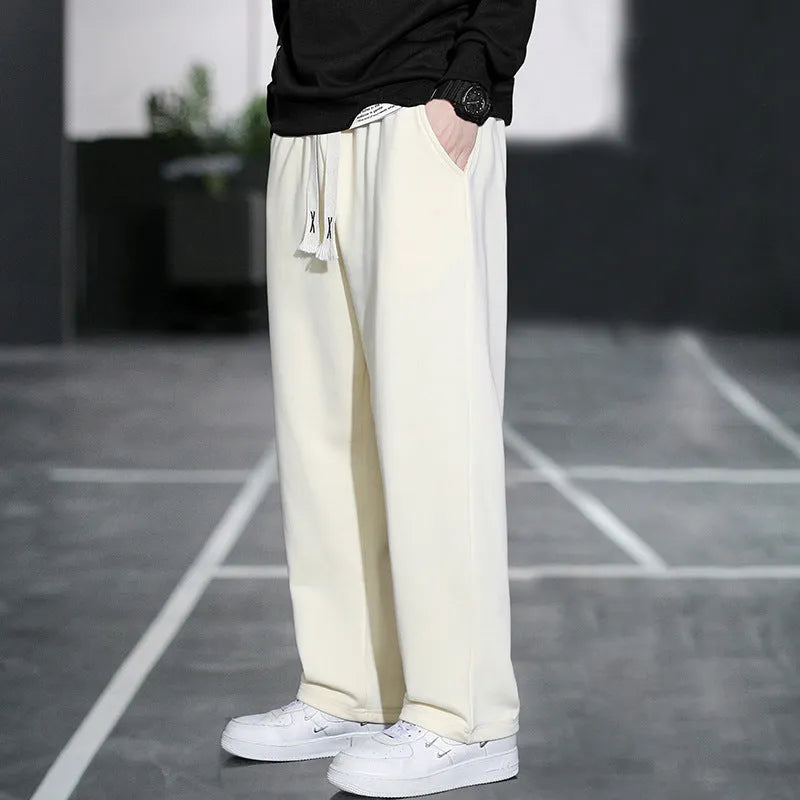 Men's grey bamboo fibre sports trousers with multiple pockets and high waist design