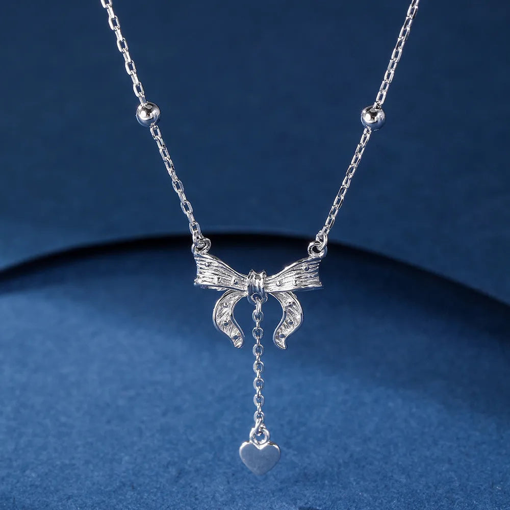 S925 silver necklace with butterfly and heart pendant on an adjustable O-ring chain