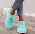 Women's high-cut lace-up platform sneaker in a choice of seven colours on a rubber sole.