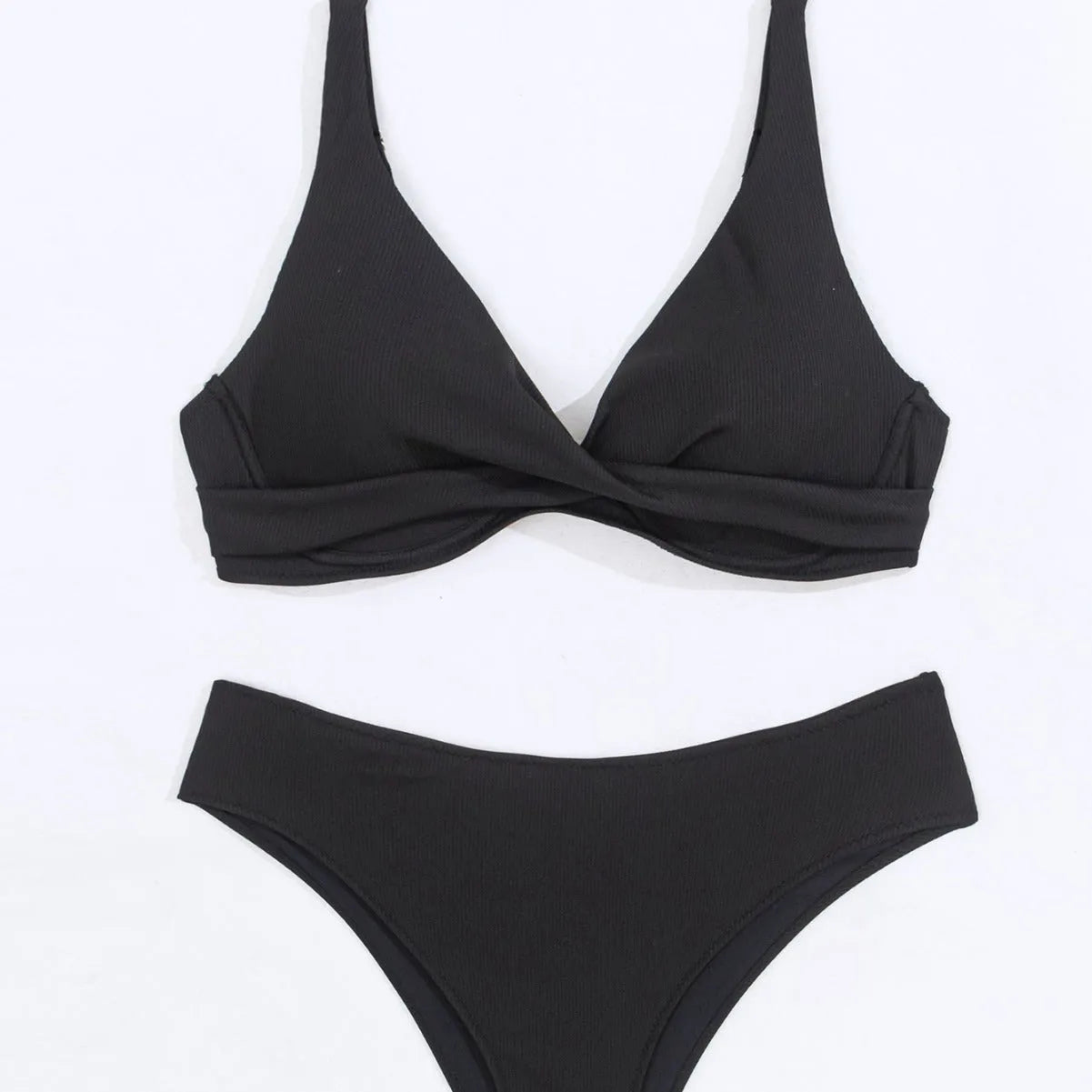 Women's solid colour rib fabric bikini set in black, green, or blue.
