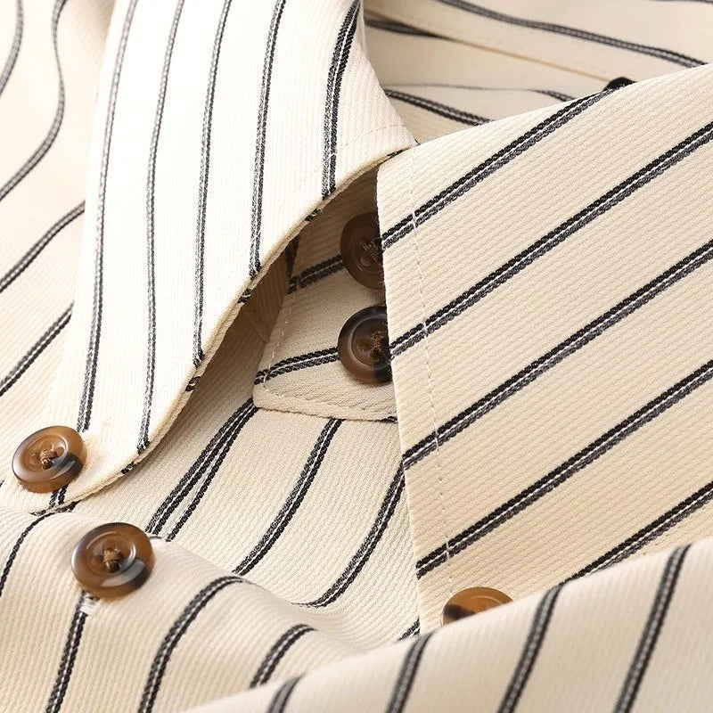 Coffee coloured striped men's long-sleeved business shirt with slim fit on a plus-size model