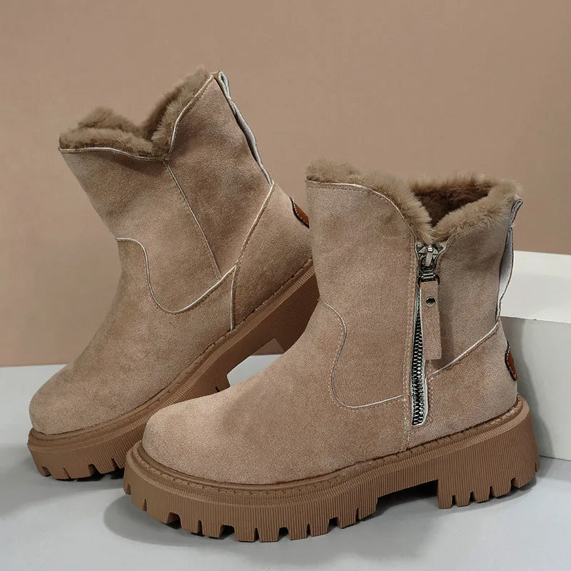 Women's black high-top snow boots with a side zipper and round toe on a non-slip rubber sole.