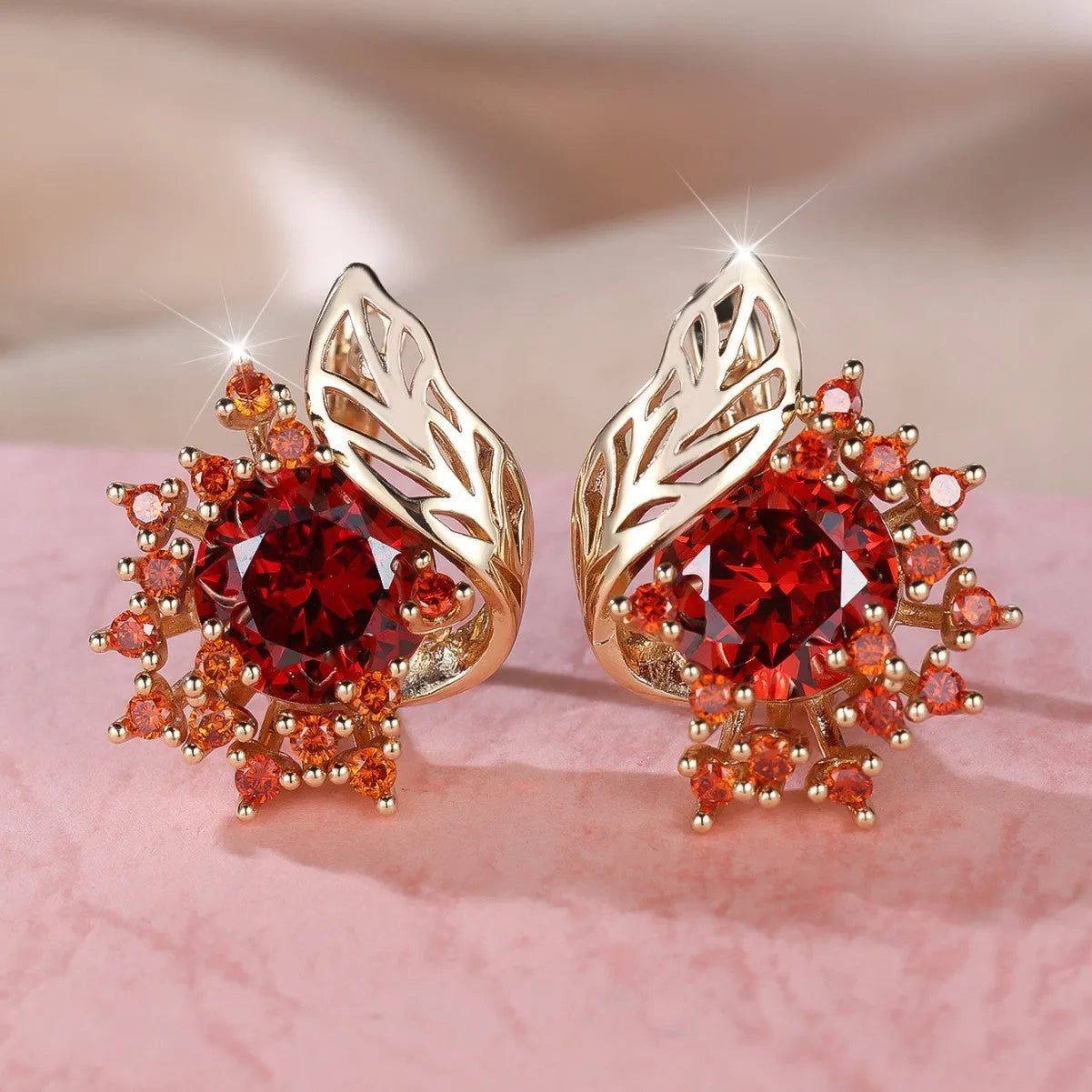 Round flower feather earrings with zircon stones in champagne gold finish, approximately 2-3cm diameter