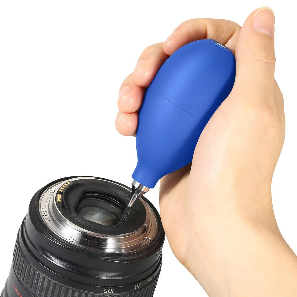 Blue and black rubber handheld air blower for dust removal on cameras and phones.