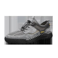 Men's brown suede low-top casual tennis shoes with elastic band and hand-stitched rubber sole.