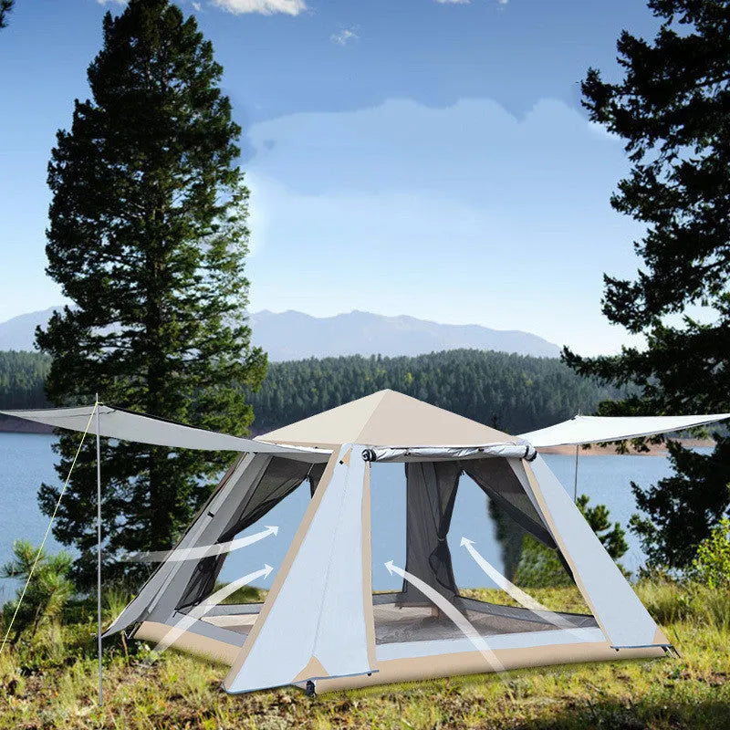White fully automatic quick-open camping tent with aluminium poles, double-layer construction, pitched outdoors in a field