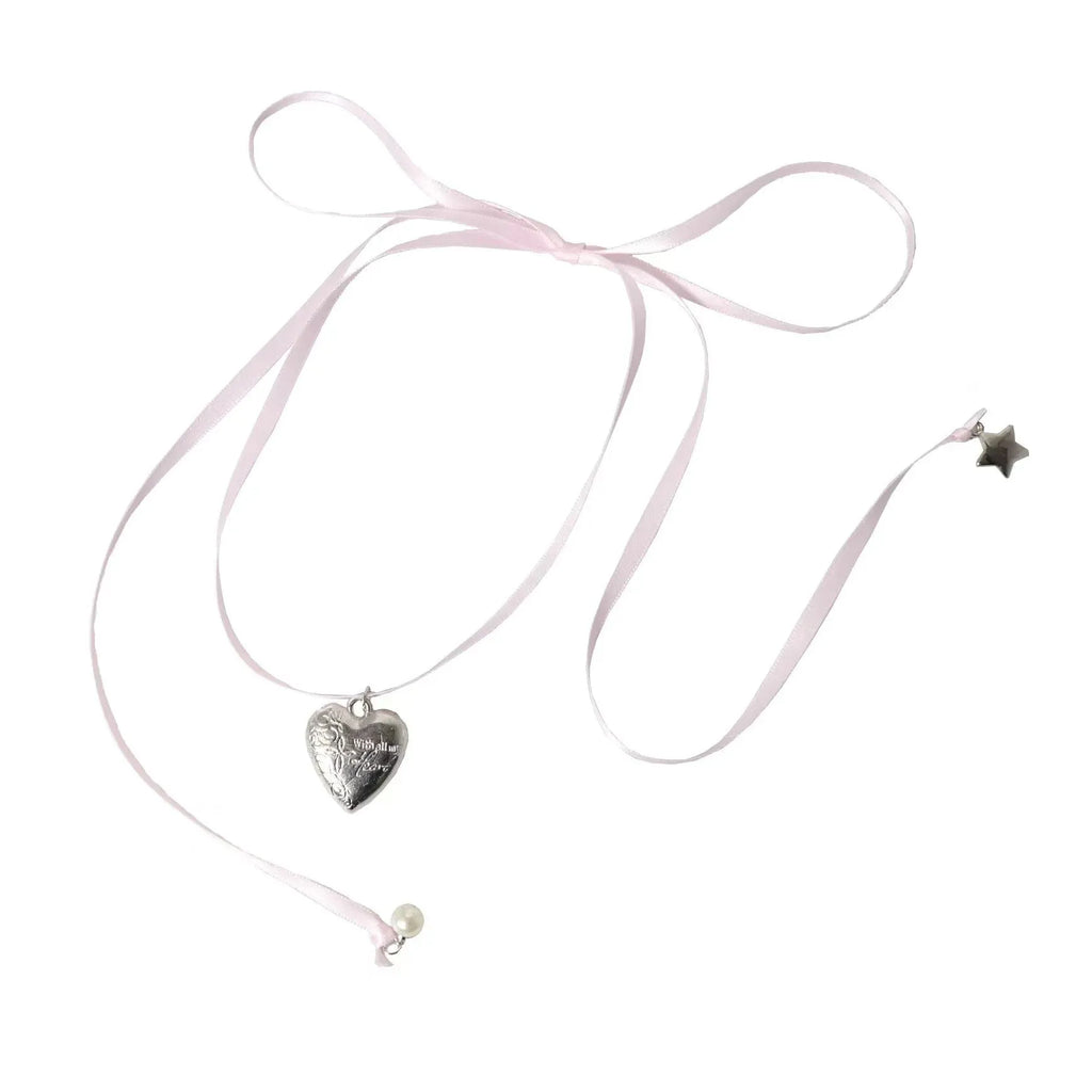 Women's alloy fashion necklace with a detailed ribbon and love pendant design on a clavicle chain, shown in one of 33 colour options.