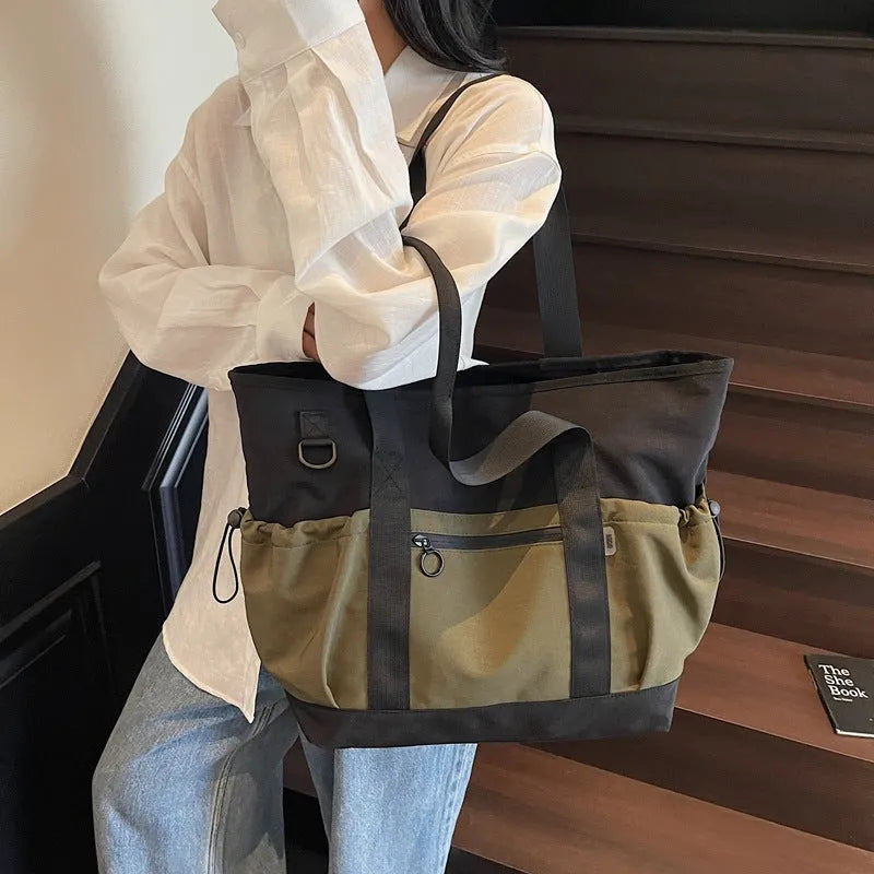 Women's lightweight oxford cloth travel and gym bag in grey colour with letter pattern